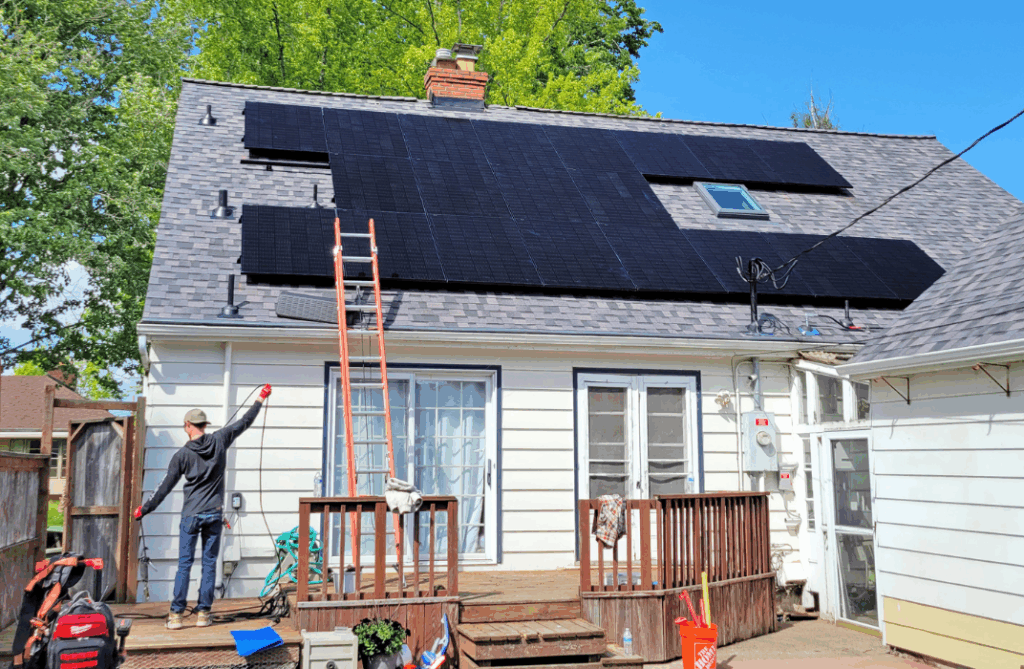 Installing solar panels on residential roof
