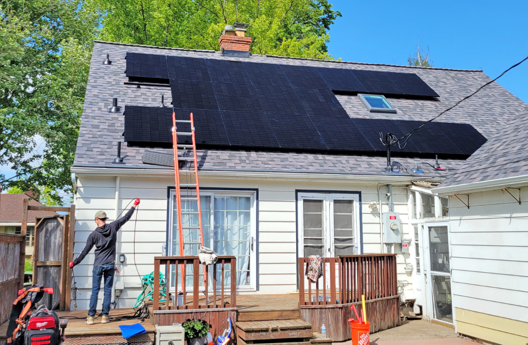 Installing solar panels on residential roof