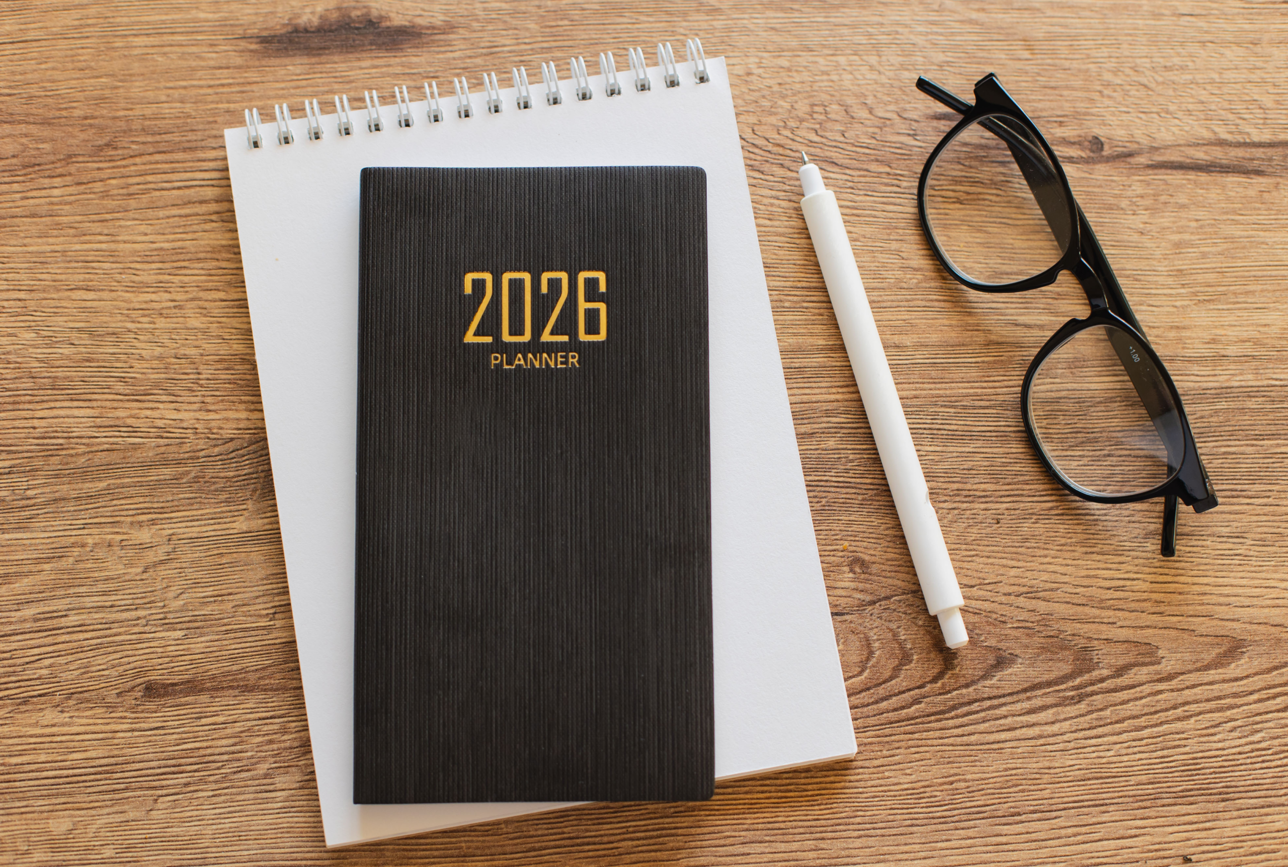 A 2026 planner, symbolizing the 2026 changes with solar commercial and industrial professionals need to know