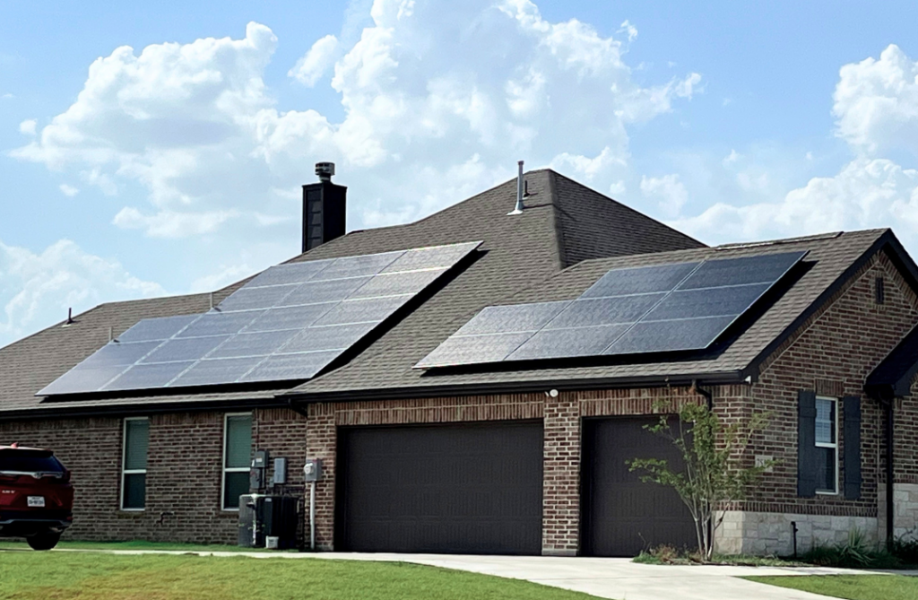Brick house with rooftop solar panels